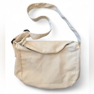 SLOUCHY unlined crossbody bag w/nice wide adjustable strap. Soft and lightweight